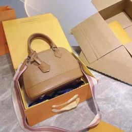 2023 Water Ripple Crossbody Bags Shell Totes Women Fashion Messenger Bag Designer Handbags Lady Purse M57426 Vintage Cowhid