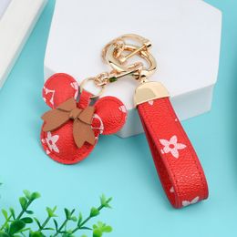 Designer fashion Key ring Mobile phone strap 2022 new cute cartoon keychain leather bag key pendant car keychain decoration gift