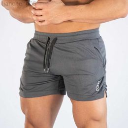 Men's Shorts 2023 New Mens Gym Training Shorts Men Sports Casual Clothing Fitness Workout Running Grid Quick-Drying Compression Shorts M-3XL W0320