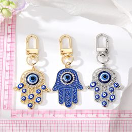 Evil Eye Hamsa Hand Keychain Key Ring For Women Men Hollow Fatima Hand Blue Eye Bag Car Key Accessories