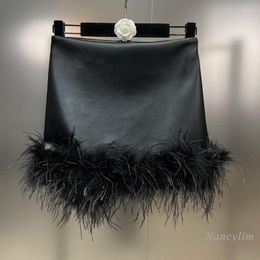 Skirts Spring 2023 Ostrich Feather Decorative PU Leather Skirt For Women European And American Style Y2K Package Hip Fashion
