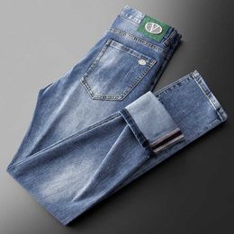 Spring/summer 2023 Thin Light Blue Jeans Men's Fashion Hardware Decoration Elastic Slim Fit Small Feet Pants Men