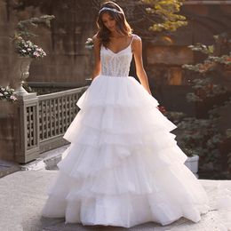 Glitter Cascading Ruffles Ball Wedding Dresses Spaghetti Strap Backless Gown Pärled Layered Kirt Womens Bridal Dress 326 326