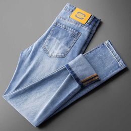 2023 Spring/summer Thin Light Blue Jeans Men's Back Pocket Laser Pattern Elastic Slim Fit Small Feet Fashion Pants Men