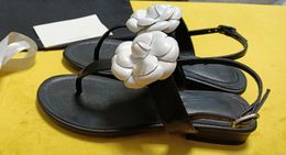 Designer Sandálias de luxo Ballet Flats Mulheres Mulas de sapatos únicos Mulher sandália de couro genuíno Sapatos casuais de pele de casca de lasca de chinelos 35-41 Camellia
