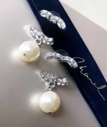 Senior sense luxury letter pearl earrings female exquisite socialite style everything with light luxury ear clip silver needle stud Wholesale
