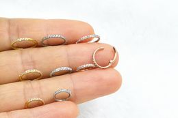 Nose Rings Studs 20pcslot 316L Steel Seamless Hinged Segment Ring Clicker Ear Cartilage Hoop Septum CZ 230325