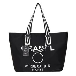 Designer Brands Shopping Bags Women Triangle Label Waterproof Leisure Travel Bag Large Capacity Nylon Mommy Tote Ladies Shoulder Bag Handbag r0325