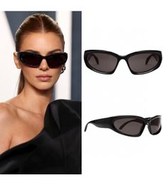 2023 Notícias Marca de luxo de luxo Cat Olhe Olhos de sol com óculos de sol retangulares de alta qualidade homens homens de óculos de vidro feminino lente UV400 unissex com caixa