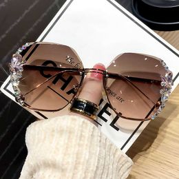 Luxury Designer New Men's and Women's Sunglasses 20% Off Rhinestone frameless sunscreen anti ultraviolet diamond rimmed personality female big face slim tide brand