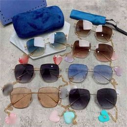 Luxury Designer Fashion Sunglasses 20% Off Fashion Version Hot family box chain Ni same strawberry pendant