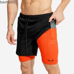 Men's Shorts Summer new men's sports shorts 2 in 1 safety pocket sexy running shorts men's double layer breathable fitness training pants W0327
