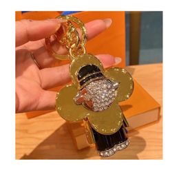 حلقات المفاتيح حرف V Ljia سلسلة مفاتيح عباد الشمس حقيبة السيارة قلادة هدية مصمم للرجال والنساء مجوهرات فاخرة orecchini بيجو cjewelers