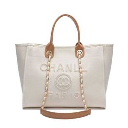 Classici di lusso Borse da donna Beach Beach Pearl Canvas Rightided Packs Borsa Small Large Pack IVJT