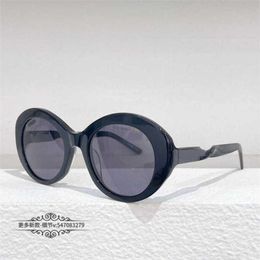 Top Luxury Designer Sunglasses 20% Off Fashion Round Frame Female INS Network Red Same Twisted Leg