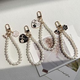 4 styles pearl chain keychains girl women handbag pendant decoration key ring fashion accessories wholesale