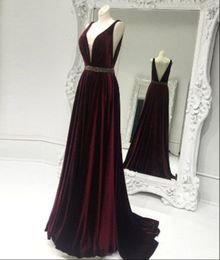 Stunning Burgundy Velvet Long Evening Dresses A Line Prom Party Dress Open Back Plunging Neck Evening Gowns Graduation Dresses Beaded Sash