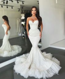 Elegant Sleeveless Lace Mermaid Bridal Gown - Backless Sweetheart Neckline Wedding Dress in Ivory