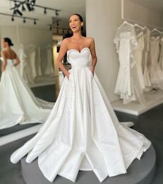 Sweetheart A Line Wedding Dresses for bride Pearls detail Satin Wedding Dress vestidos de novia Sweep Train corset back designer bridal gowns