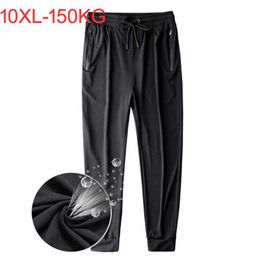 Men's Pants 9XL 10XL 145KG Summer men Breathable Ice silk pants gym big size 10XL pants big sales home hole pants sports elasticity Trousers W0325