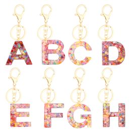 2023 pink flower keychain 26 Letter Resin with Pink Tassel Gradient Butterfly Pendant Key Ring Women Bag Ornaments Accessories Gift