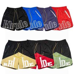 4ETM Rhude Mens Shorts Athletic Casual Mesh Short Men Womens High Quality Classic Beach Fashion Luxury Designer Street Hip Hop Blue Green and Red