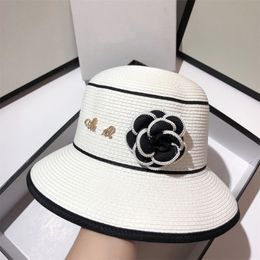 Designer straw hat brand Gold characters cap Camellia flowers and grass woven basin hats fashion retro ladies' gift Woman Wide Brim Hats Summer Artichaut Bucket Hat