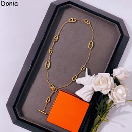 Tang Yazhubao luxury necklace European and American fashion pig nose titanium steel micro-inlaid zircon short necklace designer gift accessories with box.