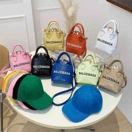 Urban bag female 2023 new candy Colour stone letter portable One Shoulder Messenger style bright face shell clearance sale