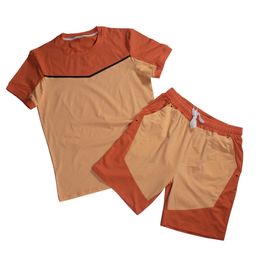 Set sportivo manica corta da uomo T-shirt girocollo estiva con logo personalizzato + pantaloni Patchwork Set di due pezzi