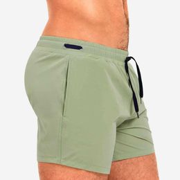 Men's Shorts European American Fashion Simple Solid Colour Beach Three Point Shorts Mesh Lining Swimming Surf Sports Fitness Quick Dry Shorts Z0504