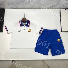 23ss kids designer clothes kids set boys t shirt Shorts suit Colour matching lapels Little yellow duck printing Polo shirts Elastic waist shorts suits baby clothes