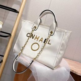 Fashion Handbags Beach Bags Brand Luxury Metal Badge Tote Bag Small Evening Handbag Female Capacity Large Leather One Shoulder Backpack factory outlet 70% off DWN9