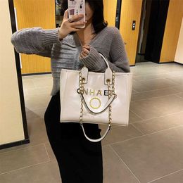 70% Off Purses on sale Classic Luxury Handbags Beach Bags Brand Metal Badge Tote Bag Small Evening Handbag Female Capacity Large Leather One Shoulder Backpack Fxjm