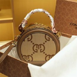COVCHIE counter genuine leather 2024 new portable cake cross body printed small round bag Designer Handbag Online sale
