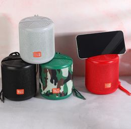 2023 round mini size portable BT5.3 fm radio wireless music tws speaker with phone holder tg356