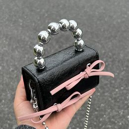 Designer Fashion Mini Shoulder Bags Bowknot Black White Cross Body Bags Lipstick Air Cushion Headphones Small Makeup Organiser