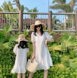 Family Matching Outfits Parent Child Summer Korean Girls' Hollow Embroidered Princess Skirt Holiday Dress Mother Dress 230506