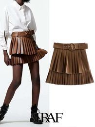 Skirts TRAF Women Fashion Faux Leather Belted Short Pleated Skirt Zipper Female Skirts Mujer 230508