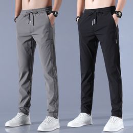 Men's Pants Men's Ice Silk Trousers Solid Color Mid-Waist Loose Breathable Straight-Leg Casual Pants Thin Quick-Drying Sports Pants 230508