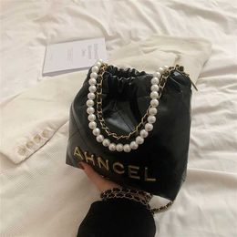 Cheap Purses on sale Netizen Same Style Small Fragrant Letter Pearl Chain Garbage Bag Single Shoulder Oblique Straddle 2023 New