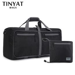 Duffel Bags TINYAT Men Folding Travel Bag Protable Women Tote Bag Large Capacity Waterproof Nylon Travel Duffel Bag Black luggage Male 230509