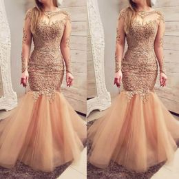 Sexy Evening Dresses Gold Mermaid Prom Gowns Lace Appliques Crystal Beads Jewel Neck Illusion Long Sleeves Floor Length Special Ocn Formal Wear