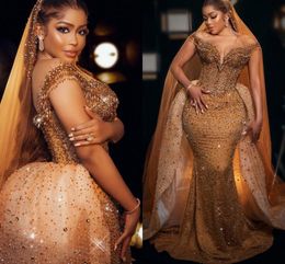 Amazing Gold African Girls Trumpet Prom Dresses With Detachable Train Pearls Beaded Sheer Neck Pageant Evening Gowns Cap Sleeves Plus Size Vestidos De Festa CL2252