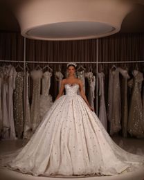 Luxury Ball Gown Wedding Dresses V Neck Sleeveless Sequins Appliques Beaded Sparkly Floor Length Ruffles Zipper Diamonds Bridal Gowns Plus Size Vestido de novia