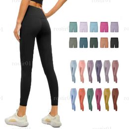 2023 gimnasio de diseñador alinea las polainas para las mujeres Pantalones de yoga de cintura alta Longitud del tobillo Noveno pantalones elásticos de fitness Lady Sexy Nude Elástico Fitness Outdoor Sport Bottoms