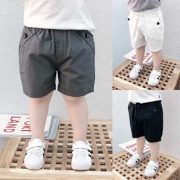 Shorts 2023 Boys Clothing Summer Trend Solid Color Casual Korean Version Cotton Elastic Waist Spliced Pocket Button Fashion 230510