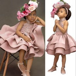 2023 Blush Pink Flower Girls Dresses For Weddings Halter Sleeveless Lace Appliques Crystal Beads Short Knee Length Tiered Bow Birthday Children Girl Pageant Gowns