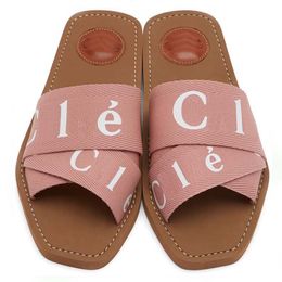 Slippers designer sliders slides sandals woody flat mule The Maison's O signature adorns the inner sole The easy slip-on design makes this flat a summer essentia964