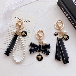 Designers Fashion Keyring Keychains Luxury Brands Pearl Handmade Keyrings Women Lovers Couple Bags Key Chains Lanyards